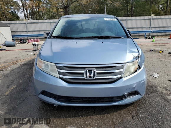2013 Honda Odyssey EX z VIN 5FNRL5H40DB051489, wystawiony jako Copart lot #41862515 z przebiegiem 172 966 mil mil oraz Szkody całkowita. Historia ofert i sprzedaży dostępna na DreamBid. Obrazek 5.