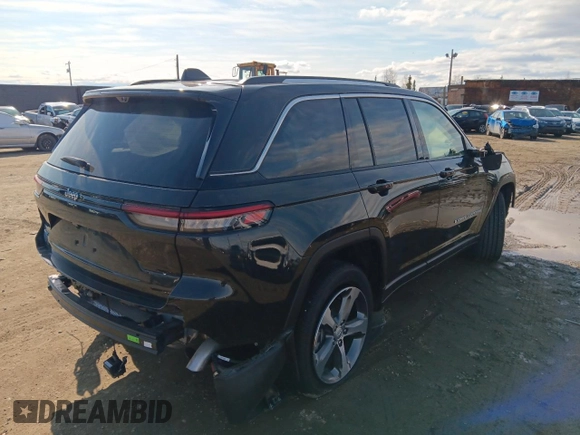2023 Jeep Grand Cherokee 30th Anniversary with VIN 1C4RJYB66P8788458, listed as a Copart auction lot 54022075 with 392 mi miles and Salvage title. Bid and sale history available at DreamBid. Image 3.