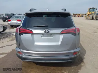2018 Toyota RAV4 LE with VIN 2T3ZFREV2JW464807, listed as a IAAI auction lot 40966277 with 113,053 mi miles. Bid and sale history available at carsss.com. Image 17.