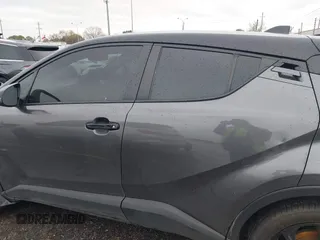 2021 Toyota C-HR LE with VIN JTNKHMBX0M1129080, listed as a IAAI auction lot 41321604 with 52,916 mi miles. Bid and sale history available at carsss.com. Image 14.