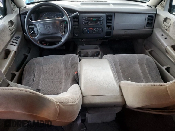 2001 Dodge Dakota z VIN 1B7GG2AX11S108005, wystawiony jako Copart lot #87124934 z przebiegiem 248 482 mil mil oraz Czysty tytuł • Clean title. Historia ofert i sprzedaży dostępna na DreamBid. Obrazek 8.