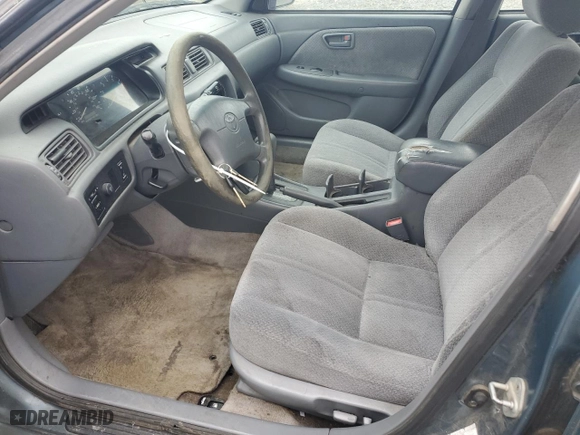 2000 Toyota Camry CE with VIN JT2BG22K7Y0509084, listed as a Copart auction lot 48639025 with 257,318 mi miles and Salvage Title. Bid and sale history available at carsss.com. Image 7.