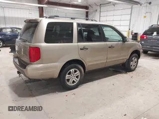 2005 Honda Pilot EX with VIN 2HKYF18475H515604, listed as a IAAI auction lot 42040563 with 320,399 mi miles and . Bid and sale history available at carsss.com. Image 4.