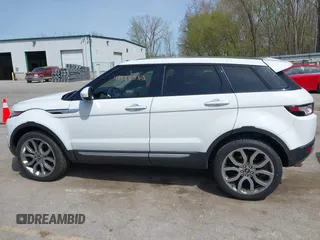 2015 Land Rover Range Rover Evoque Prestige z VIN SALVV2BG4FH076675, wystawiony jako IAAI lot #42138353 z przebiegiem 99 751 mil mil oraz . Historia ofert i sprzedaży dostępna na DreamBid. Obrazek 14.