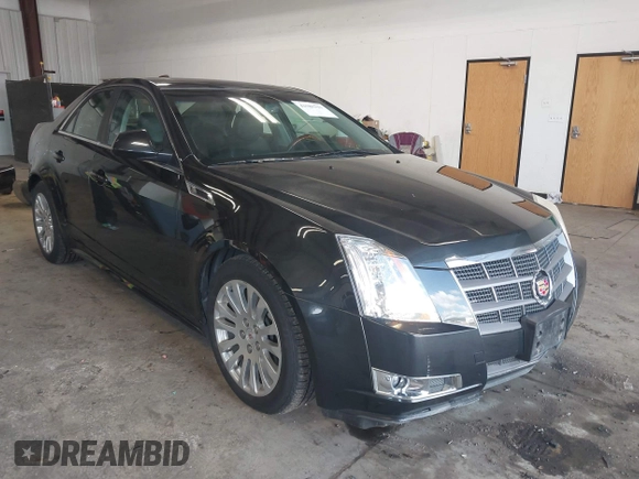 2011 Cadillac CTS Performance with VIN 1G6DL5ED6B0131490, listed as a IAAI auction lot 41980231 with 75,040 mi miles and . Bid and sale history available at DreamBid. Image 1.