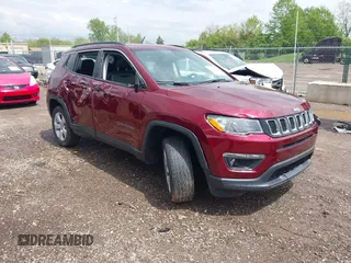 2021 Jeep Compass Latitude with VIN 3C4NJDBBXMT504993, listed as a IAAI auction lot 42181872 with 56,053 mi miles and . Bid and sale history available at DreamBid. Image 1.