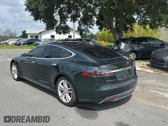 2014 Tesla Model S 60 z VIN 5YJSA1H11EFP44322, wystawiony jako Copart lot #59038135 z przebiegiem 146 015 mil mil oraz Czysty tytuł • Clean title. Historia ofert i sprzedaży dostępna na DreamBid. Obrazek 3.