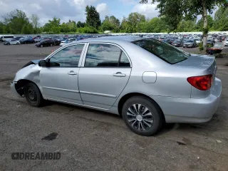 2005 Toyota Corolla CE with VIN 1NXBR32E25Z513898, listed as a Copart auction lot 57679695 with 189,869 mi miles and Salvage title. Bid and sale history available at DreamBid. Image 2.