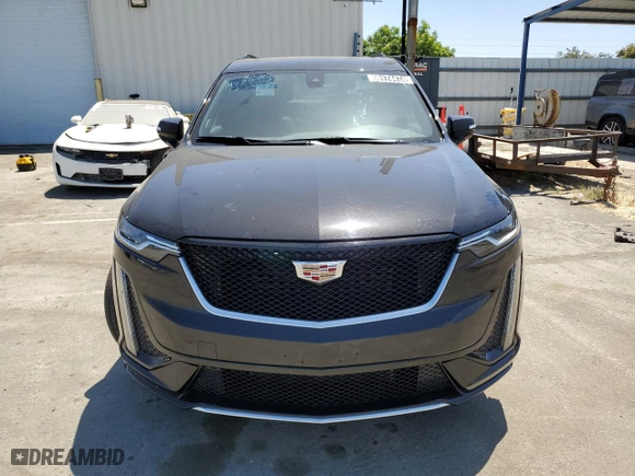 2023 Cadillac XT6 AWD Sport with VIN 1GYKPGRS2PZ130847, listed as a Copart auction lot 58174474 with 11,958 mi miles and Clean Title. Bid and sale history available at carsss.com. Image 5.