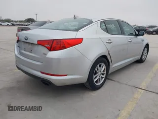 2013 Kia Optima LX with VIN KNAGM4A79D5377485, listed as a IAAI auction lot 41290306 with 172,253 mi miles. Bid and sale history available at carsss.com. Image 4.