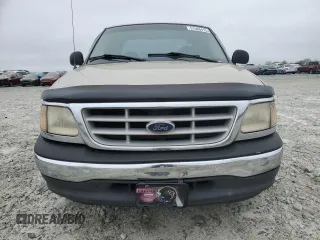 1999 Ford F-150 with VIN 1FTZX1721XNA37541, listed as a Copart auction lot 51588415 with 267,071 mi miles and Salvage title. Bid and sale history available at DreamBid. Image 5.