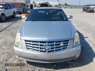 2006 Cadillac DTS 1SD z VIN 1G6KD57Y86U110272, wystawiony jako IAAI lot #42059673 z przebiegiem 147 610 mil mil oraz . Historia ofert i sprzedaży dostępna na DreamBid. Obrazek 6.