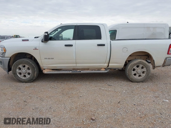 2023 Ram 2500 Big Horn with VIN 3C6UR5DL7PG587769, listed as a IAAI auction lot 41300388 with 33,384 mi miles. Bid and sale history available at carsss.com. Image 14.