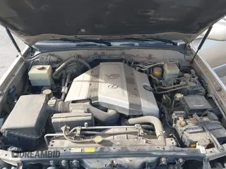 2000 Lexus LX 470 with VIN JT6HT00W0Y0098917, listed as a IAAI auction lot 41937661 with 180,980 mi miles and . Bid and sale history available at DreamBid. Image 10.