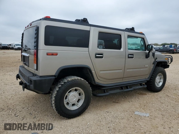 2003 Hummer H2 with VIN 5GRGN23U73H102412, listed as a Copart auction lot 87419024 with 176,456 mi miles and Salvage Title. Bid and sale history available at carsss.com. Image 3.