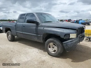 2000 Dodge Ram 1500 with VIN 1B7HC13YXYJ173323, listed as a Copart auction lot 69969774 with 425,918 mi miles and Salvage Title. Bid and sale history available at carsss.com. Image 4.