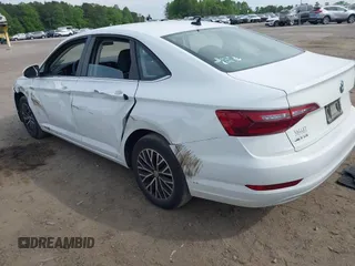 2021 Volkswagen Jetta S z VIN 3VWC57BU0MM021874, wystawiony jako IAAI lot #42124747 z przebiegiem 89 887 mil mil oraz . Historia ofert i sprzedaży dostępna na DreamBid. Obrazek 3.