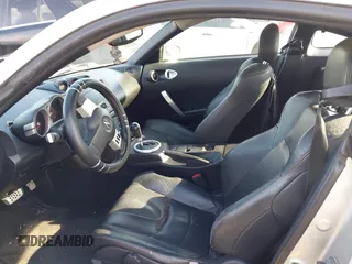 2004 Nissan 350Z Touring with VIN JN1AZ34E94T050033, listed as a IAAI auction lot 41652568 with 120,955 mi miles. Bid and sale history available at carsss.com. Image 5.