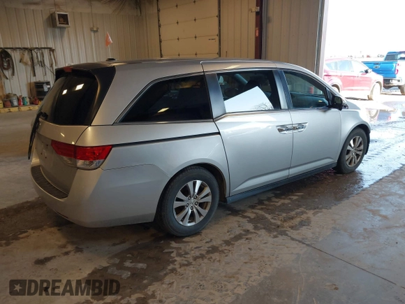 2015 Honda Odyssey EX-L with VIN 5FNRL5H6XFB063430, listed as a IAAI auction lot 41913142 with 238,051 mi miles and . Bid and sale history available at carsss.com. Image 4.
