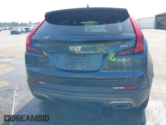 2021 Cadillac XT4 FWD Premium Luxury with VIN 1GYFZCR42MF007617, listed as a IAAI auction lot 42437974 with 126,071 mi miles and . Bid and sale history available at DreamBid. Image 16.