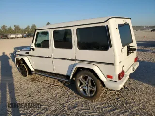 2014 Mercedes-Benz G-Class G 63 AMG with VIN WDCYC7DFXEX216271, listed as a Copart auction lot 77036904 with 59,864 mi miles and Salvage Title. Bid and sale history available at carsss.com. Image 2.