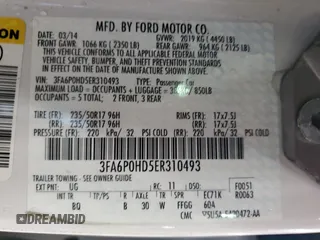2014 Ford Fusion SE z VIN 3FA6P0HD5ER310493, wystawiony jako Copart lot #58197095 z przebiegiem 135 952 mil mil oraz Tytuł czysty. Historia ofert i sprzedaży dostępna na DreamBid. Obrazek 12.