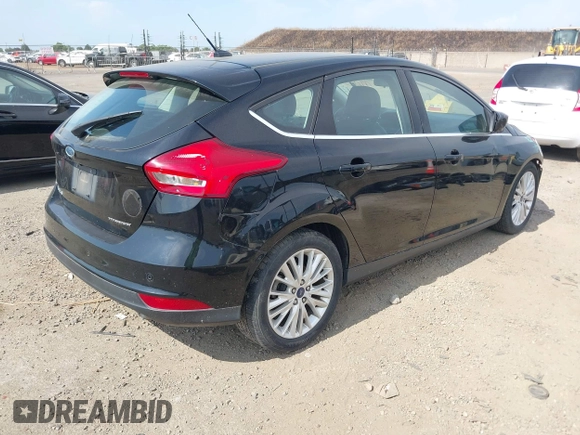 2017 Ford Focus Titanium with VIN 1FADP3N29HL319759, listed as a IAAI auction lot 42458289 with 213,674 mi miles and . Bid and sale history available at DreamBid. Image 4.
