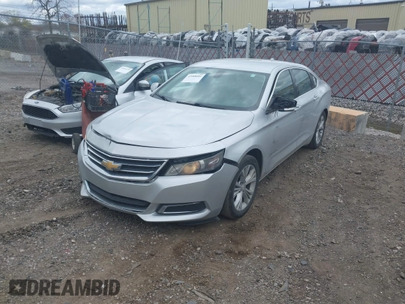 2014 Chevrolet Impala LT with VIN 1G1125S34EU123487, listed as a IAAI auction lot 42088001 with 184,553 mi miles and . Bid and sale history available at DreamBid. Image 17.