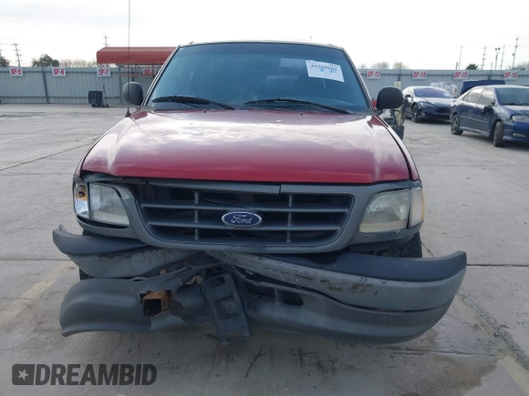 2003 Ford F-150 XL with VIN 1FTRX17213NB65093, listed as a IAAI auction lot 41568065 with 286,293 mi miles. Bid and sale history available at carsss.com. Image 12.