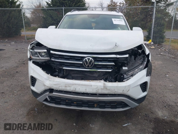 2023 Volkswagen Atlas SE with VIN 1V2KP2CA9PC556898, listed as a IAAI auction lot 40714688 with 53,598 mi miles and . Bid and sale history available at DreamBid. Image 6.