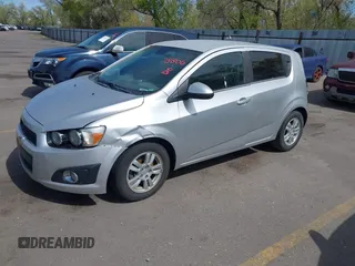 2013 Chevrolet Sonic LT with VIN 1G1JC6SG5D4210853, listed as a IAAI auction lot 42078806 with 135,837 mi miles. Bid and sale history available at carsss.com. Image 2.