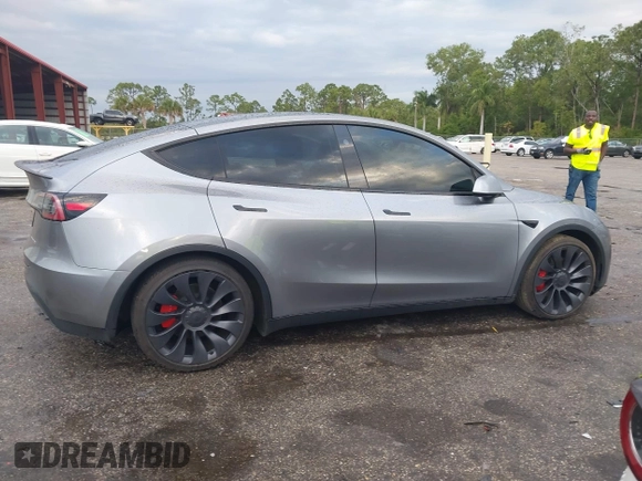 2024 Tesla Model Y Performance with VIN 7SAYGDEF3RA307468, listed as a IAAI auction lot 41805853 with 10,377 mi miles and . Bid and sale history available at DreamBid. Image 12.