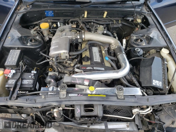 1989 Nissan Skyline z VIN HNR32002973, wystawiony jako Copart lot #73699504 z przebiegiem 72 824 mil mil oraz Szkoda całkowita • Salvage title. Historia ofert i sprzedaży dostępna na DreamBid. Obrazek 11.