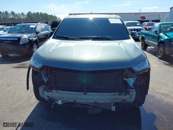 2022 Chevrolet Traverse LT Leather with VIN 1GNEVHKWXNJ141805, listed as a IAAI auction lot 41641352 with 71,504 mi miles. Bid and sale history available at carsss.com. Image 6.