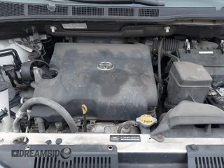 2015 Toyota Sienna XLE with VIN 5TDYK3DC9FS595827, listed as a IAAI auction lot 41014820 with 119,143 mi miles. Bid and sale history available at carsss.com. Image 10.