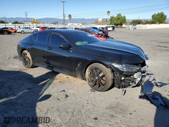 2023 BMW 8 Series M850i with VIN WBAGV8C06PCL57473, listed as a Copart auction lot 39398193 with Not provided miles and . Bid and sale history available at DreamBid. Image 4.