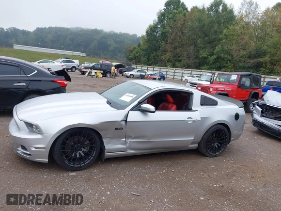 2013 Ford Mustang GT with VIN 1ZVBP8CF7D5281965, listed as a IAAI auction lot 40408688 with 121,477 mi miles. Bid and sale history available at carsss.com. Image 14.