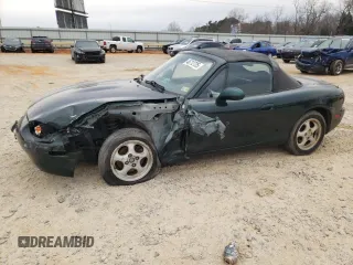 1999 Mazda MX-5 Miata z VIN JM1NB3532X0119487, wystawiony jako Copart lot #46712725 z przebiegiem 158 909 mil mil oraz Szkoda całkowita • Salvage title. Historia ofert i sprzedaży dostępna na DreamBid. Obrazek 1.