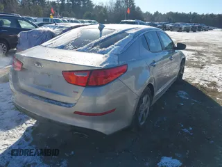 2014 Kia Optima LX with VIN 5XXGM4A77EG351662, listed as a IAAI auction lot 41188778 with 200,199 mi miles. Bid and sale history available at carsss.com. Image 4.