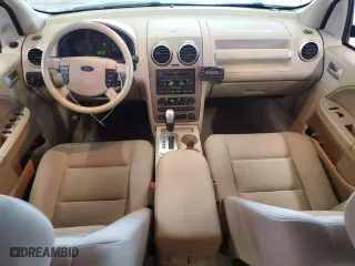 2005 Ford Freestyle SEL with VIN 1FMDK02135GA60009, listed as a Copart auction lot 52852755 with 248,780 mi miles and Salvage Title. Bid and sale history available at carsss.com. Image 8.