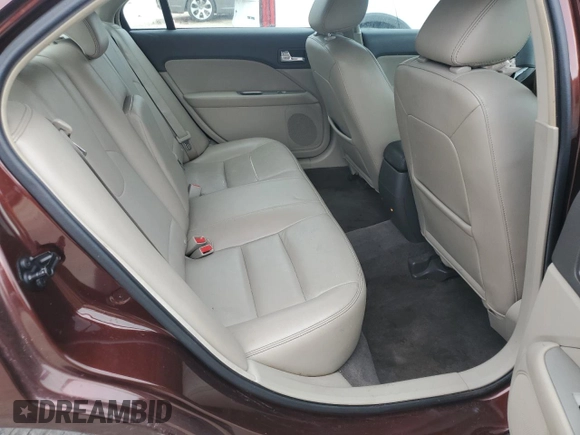 2012 Ford Fusion SEL z VIN 3FAHP0JA5CR184593, wystawiony jako Copart lot #61647265 z przebiegiem 127 720 mil mil oraz Szkoda całkowita • Salvage title. Historia ofert i sprzedaży dostępna na DreamBid. Obrazek 10.