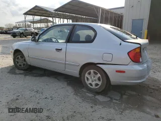 2003 Hyundai Accent GL with VIN KMHCG35CX3U270374, listed as a Copart auction lot 47240325 with 122,739 mi miles and Salvage Title. Bid and sale history available at carsss.com. Image 2.