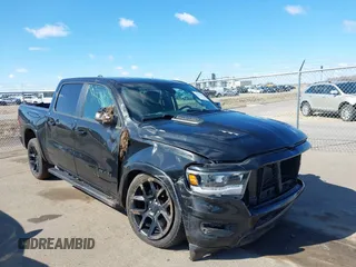 2020 Ram 1500 Laramie with VIN 1C6SRFJT0LN101435, listed as a IAAI auction lot 42033822 with 58,408 mi miles and . Bid and sale history available at DreamBid. Image 1.