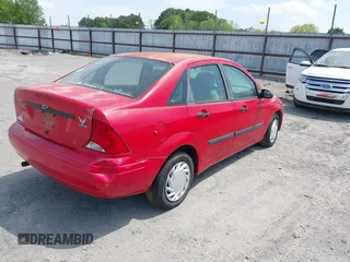 2002 Ford Focus LX with VIN 1FAFP33P32W300699, listed as a IAAI auction lot 42062916 with 108,532 mi miles and . Bid and sale history available at DreamBid. Image 4.