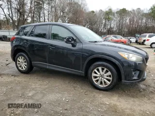 2014 Mazda CX-5 Touring with VIN JM3KE2CY2E0396423, listed as a Copart auction lot 44047505 with 152,543 mi miles and Salvage Title. Bid and sale history available at carsss.com. Image 4.