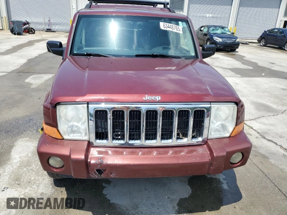 2007 Jeep Commander Sport z VIN 1J8HG48K27C527423, wystawiony jako Copart lot #63448765 z przebiegiem 212 856 mil mil oraz Szkoda całkowita • Salvage title. Historia ofert i sprzedaży dostępna na DreamBid. Obrazek 5.