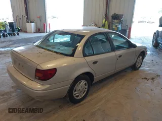 2001 Saturn SL z VIN 1G8ZF52841Z208220, wystawiony jako IAAI lot #42288195 z przebiegiem Nie podano mil oraz . Historia ofert i sprzedaży dostępna na DreamBid. Obrazek 4.