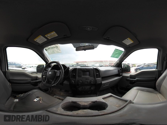 2015 Ford F-150 XL with VIN 1FTMF1E84FKD12758, listed as a IAAI auction lot 41841584 with 59,950 mi miles and . Bid and sale history available at DreamBid. Image 18.
