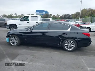 2015 Infiniti Q50 z VIN JN1BV7AP3FM336566, wystawiony jako IAAI lot #42349544 z przebiegiem 84 077 mil mil oraz . Historia ofert i sprzedaży dostępna na DreamBid. Obrazek 15.