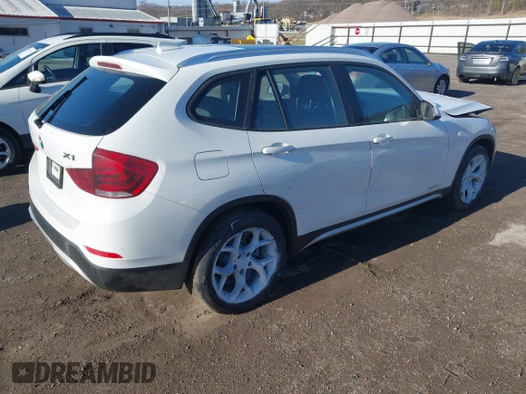 2015 BMW X1 xDrive28i z VIN WBAVL1C57FVY25598, wystawiony jako IAAI lot #41860463 z przebiegiem Nie podano mil oraz . Historia ofert i sprzedaży dostępna na DreamBid. Obrazek 4.